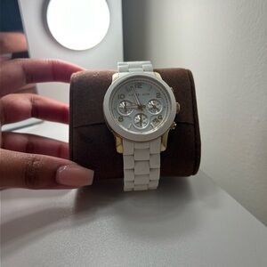 Michael Kors Women’s Watch Gold and white face.